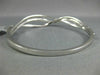 .56CT DIAMOND 18KT WHITE GOLD 3D MULTI ROW CRISS CROSS X LOVE BANGLE BRACELET