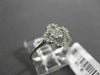 ANTIQUE SMALL .16CT DIAMOND 14KT WHITE GOLD FLORAL FOUR PETAL PAVE CLUSTER RING