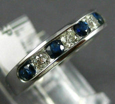 ESTATE .79CT DIAMOND & AAA SAPPHIRE 14KT WHITE GOLD 3D CHANNEL ANNIVERSARY RING