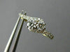 ESTATE .61CT DIAMOND 14KT YELLOW GOLD 3D TWO STONE LOVE CLASSIC HUGGIE EARRINGS