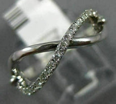 ESTATE .12CT ROUND DIAMOND 14KT WHITE GOLD 3D INFINITY FRIENDSHIP OPEN LOVE RING