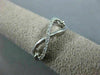 ESTATE .12CT ROUND DIAMOND 14KT WHITE GOLD 3D INFINITY FRIENDSHIP OPEN LOVE RING