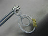 .85CT WHITE & FANCY YELLOW DIAMOND 18KT TWO TONE GOLD OVAL BOW HANGING EARRINGS