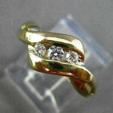 ESTATE .12CT ROUND DIAMOND 14KT YELLOW GOLD 3 STONE CHANNEL INFINITY RING #14197