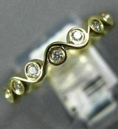 ESTATE .29CT DIAMOND 14KT YELLOW GOLD ETERNITY INFINITY WEDDING ANNIVERSARY RING