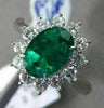 ANTIQUE LARGE 2.14CT DIAMOND & AAA COLOMBIAN EMERALD PLATINUM CLUSTER OVAL RING