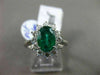 ANTIQUE LARGE 2.14CT DIAMOND & AAA COLOMBIAN EMERALD PLATINUM CLUSTER OVAL RING