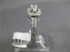 ESTATE .80CT DIAMOND 14KT WHITE GOLD TWO STONE SEMI ETERNITY FILIGREE LOVE RING