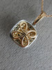 ESTATE .76CT WHITE & FANCY YELLOW DIAMOND 18KT WHITE & ROSE GOLD 3D HALO PENDANT