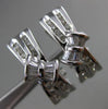 ESTATE WIDE .50CT ROUND BAGUETTE DIAMOND 14KT GOLD BOW UMBRELLA CLIP ON EARRINGS