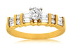 ESTATE .91CT DIAMOND 14KT YELLOW GOLD ROUND & BAGUETTE CLASSIC ENGAGEMENT RING