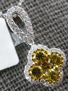 .54CT WHITE & INTENSE FANCY YELLOW DIAMOND 18KT WHITE GOLD 4 LEAF CLOVER PENDANT