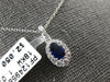 ESTATE .73CT DIAMOND & AAA SAPPHIRE 18K WHITE GOLD 3D CLASSIC OVAL HALO PENDANT