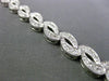 ESTATE WIDE 2.50CT DIAMOND 14KT WHITE GOLD 3D WAVE INFINITY TENNIS BRACELET