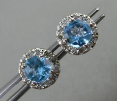 ESTATE WIDE .78CT DIAMOND & BLUE TOPAZ 14KT WHITE GOLD ROUND HALO STUD EARRINGS