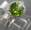 ESTATE 1.51CT DIAMOND & PERIDOT 14KT WHITE GOLD 3D ROUND HALO FRIEDNSHIP RING