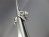 ESTATE .74CT ROUND DIAMOND 18KT WHITE GOLD 3D FLOWER SOLITAIRE STUD EARRINGS VVS