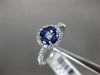 ESTATE .74CT DIAMOND & AAA SAPPHIRE 18KT WHITE GOLD CIRCULAR FLOWER PROMISE RING