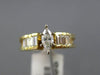 ESTATE .89CT MARQUISE & BAGUETTE DIAMOND 14K YELLOW GOLD PYRAMID ENGAGEMENT RING