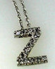 ESTATE .12CT DIAMOND 14KT YELLOW GOLD 3D CLASSIC Z INITIAL FLOATING PENDANT