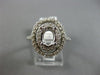 ESTATE LARGE .71CT DIAMOND 14KT WHITE GOLD OVAL HALO SEMI MOUNT ENGAGEMENT RING