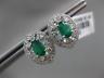ESTATE 1.32CT DIAMOND & AAA EMERALD 14KT WHITE GOLD OVAL FLOWER HUGGIE EARRINGS