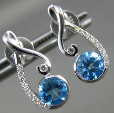 ESTATE .99CT DIAMOND & AAA BLUE TOPAZ 14K WHITE GOLD INFINITY LOVE KNOT EARRINGS