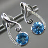 ESTATE .99CT DIAMOND & AAA BLUE TOPAZ 14K WHITE GOLD INFINITY LOVE KNOT EARRINGS