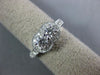 ESTATE .80CT DIAMOND 14KT WHITE GOLD TWO STONE SEMI ETERNITY FILIGREE LOVE RING