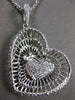 ESTATE .58CT DIAMOND 18KT WHITE GOLD 3D PAVE MULTI HEART FLOATING LOVE PENDANT