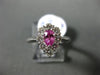 ESTATE 1.08CT DIAMOND & AAA PINK SAPPHIRE 18KT WHITE GOLD HALO ENGAGEMENT RING