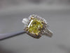 ESTATE 2.26CTW GIA FANCY YELLOW DIAMOND 18KT WHITE GOLD HALO ENGAGEMENT RING