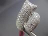 ESTATE LARGE 4.68CT DIAMOND & AAA EMERALD 18KT WHITE GOLD PAVE PANTHER FUN RING