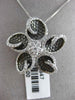 ESTATE LARGE 1.0CT DIAMOND 18KT WHITE & BLACK GOLD FLOWER STAR FLOATING PENDANT