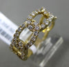 ESTATE .64CT DIAMOND 18KT YELLOW GOLD OVAL LOVE KNOT SEMI ETERNITY WEDDING RING