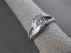 ESTATE WIDE .34CT BAGUETTE & ROUND DIAMOND 18KT WHITE GOLD 3D INFINITY LOVE RING