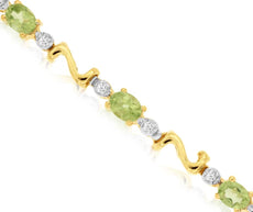 2.32CT DIAMOND & AAA PERIDOT 14KT YELLOW GOLD 3D OVAL 3 STONE TENNIS BRACELET