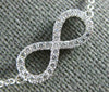 ESTATE .40CT DIAMOND 18KT WHITE GOLD 3D CLASSIC INFINITY LOVE NECKLACE