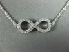 ESTATE .40CT DIAMOND 18KT WHITE GOLD 3D CLASSIC INFINITY LOVE NECKLACE