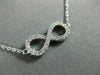 ESTATE .40CT DIAMOND 18KT WHITE GOLD 3D CLASSIC INFINITY LOVE NECKLACE