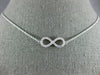 ESTATE .40CT DIAMOND 18KT WHITE GOLD 3D CLASSIC INFINITY LOVE NECKLACE