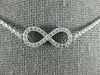 ESTATE .40CT DIAMOND 18KT WHITE GOLD 3D CLASSIC INFINITY LOVE NECKLACE