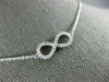 ESTATE .40CT DIAMOND 18KT WHITE GOLD 3D CLASSIC INFINITY LOVE NECKLACE