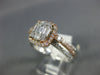 .82CT DIAMOND 14KT WHITE & ROSE GOLD 3D ROUND & BAGUETTE HALO ENGAGEMENT RING
