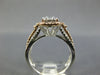 .82CT DIAMOND 14KT WHITE & ROSE GOLD 3D ROUND & BAGUETTE HALO ENGAGEMENT RING