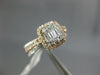 .82CT DIAMOND 14KT WHITE & ROSE GOLD 3D ROUND & BAGUETTE HALO ENGAGEMENT RING