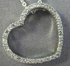 ESTATE .20CT DIAMOND 14KT WHITE GOLD CLASSIC OPEN HEART FLOATING PENDANT #20585