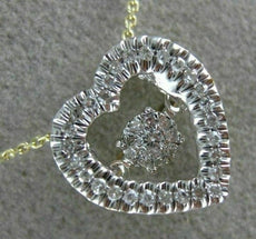 ESTATE .12CT DIAMOND 14KT 2 TONE GOLD CLUSTER HEART DANCING DIAMOND LOVE PENDANT