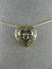 ESTATE .12CT DIAMOND 14KT 2 TONE GOLD CLUSTER HEART DANCING DIAMOND LOVE PENDANT