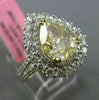 LARGE GIA 4.25CT WHITE & FANCY YELLOW DIAMOND 18KT TWO TONE GOLD ENGAGEMENT RING